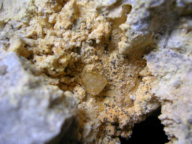 Yellow calcite with black/blue specks surrounding Pic 1