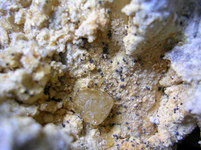 Yellow calcite with black/blue specks surrounding Pic 2